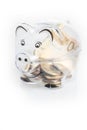 Piggy bank, coins and euro bills. Money saving concept. Banknotes closeup Royalty Free Stock Photo