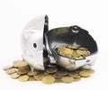 Piggy bank with coins isolated on a white background Royalty Free Stock Photo