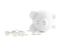 Piggy bank and coins on white background Royalty Free Stock Photo