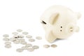 Piggy bank and coins on white background Royalty Free Stock Photo