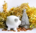 Piggy bank with coins. White ceramic moneybox Royalty Free Stock Photo