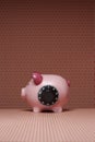 Piggy bank with combination lock side view Royalty Free Stock Photo