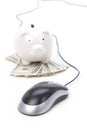 Piggy Bank and computer mouse Royalty Free Stock Photo