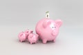 Piggy bank concept: Getting interest in the form of small piggy banks