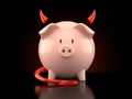Piggy bank with devil horns and tail