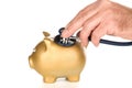 Piggy bank examined with stethoscope Royalty Free Stock Photo