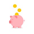 Piggy bank with falling coins Royalty Free Stock Photo