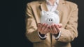 Piggy bank in the hands of a man ,finance and banking, fund growth and savings concept, saving money for the future, efficient Royalty Free Stock Photo