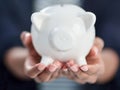 Piggy bank, hands and savings for investing in future, financial freedom and money growth. Inflation, economy and wealth Royalty Free Stock Photo