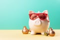 A piggy bank with holiday accessoires on a pastel background with copyspace