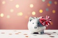 A piggy bank with holiday accessoires on a pastel background with copyspace