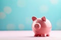 A piggy bank with holiday accessoires on a pastel background with copyspace