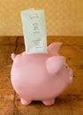 Piggy Bank with IOU Note Royalty Free Stock Photo