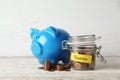 Piggy bank and jar of coins with word PENSION Royalty Free Stock Photo