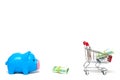 Piggy bank and korean money and shopping cart on white background : economy concept Royalty Free Stock Photo