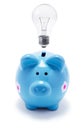 Piggy Bank and Light Bulb Royalty Free Stock Photo