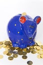 Mouse hand painted piggy bank and golden coins Royalty Free Stock Photo