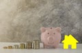 Piggy bank of money with coins stack stair step up growing growth saving money for house. Concept business financial Royalty Free Stock Photo