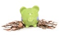 Piggy bank moneybox with British currency coins Royalty Free Stock Photo