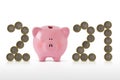 Piggy bank with 2021 number made of euro coins - Concept of economy and savings for year 2021 Royalty Free Stock Photo