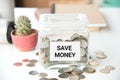 piggy bank, pile gold coin, with word text save money on paper i