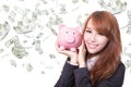 Piggy bank savings woman smiling happy Royalty Free Stock Photo