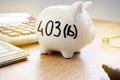 Piggy bank with sign 403b. Retirement plan. Royalty Free Stock Photo
