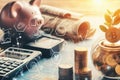 piggy bank sits on table next to calculator and stack coins Royalty Free Stock Photo