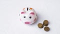 Piggy bank and stack of saving money in white background. saving money is an investment for the future. Banking investment Royalty Free Stock Photo