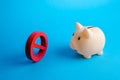 Piggy bank staring at a red prohibition sign no. Blockages and restrictions in working with finances. Countering money laundering Royalty Free Stock Photo