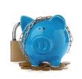 Piggy bank with steel chain, padlock and coins isolated. Money safety concept Royalty Free Stock Photo