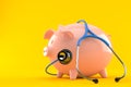 Piggy bank with stethoscope Royalty Free Stock Photo