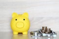 Piggy bank and stethoscope on wooden background, Save money for Medical insurance and Health care concept Royalty Free Stock Photo