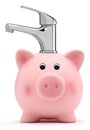 Piggy bank with tap water saving concept Royalty Free Stock Photo