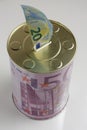 Piggy bank with twenty euro banknote, top view Royalty Free Stock Photo