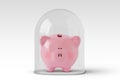 Piggy bank under glass bell - Concept of money protection and financial security