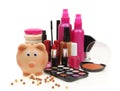 Piggy bank with various cosmetics