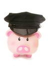 Piggy bank wearing american police cap