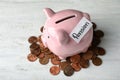 Piggy bank with word PENSION and coins Royalty Free Stock Photo