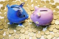 Piggy Banks and Coins Royalty Free Stock Photo