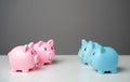 Piggy banks of different genders according to colors. Royalty Free Stock Photo