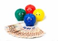 4 piggy banks with euro notes Royalty Free Stock Photo