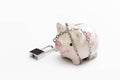 Piggy banks is lock by chain and key on white background Royalty Free Stock Photo