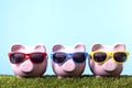 Piggy Bank sunglasses retirement vacation saving copy space Royalty Free Stock Photo