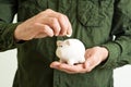 Piggy coin bank in hands Royalty Free Stock Photo