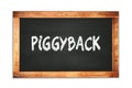 PIGGYBACK text written on wooden frame school blackboard