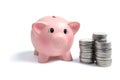 Piggybank and Coins Royalty Free Stock Photo