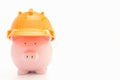 Piggybank with hard hat Royalty Free Stock Photo