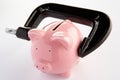 Piggybank in a vice Royalty Free Stock Photo