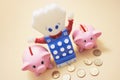 Piggybanks and Toy Cash Register Royalty Free Stock Photo